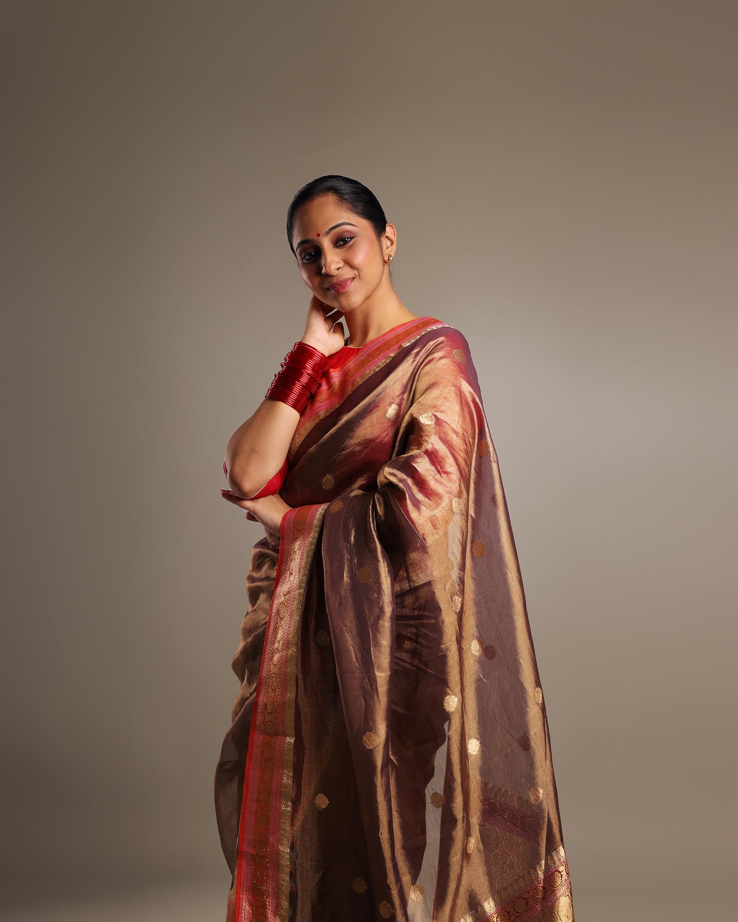 Pure Katan Tissue Metallic Payne Grey Saree with Gold Kadwa Buta and Raspberry Pink, and Gold Motif Border