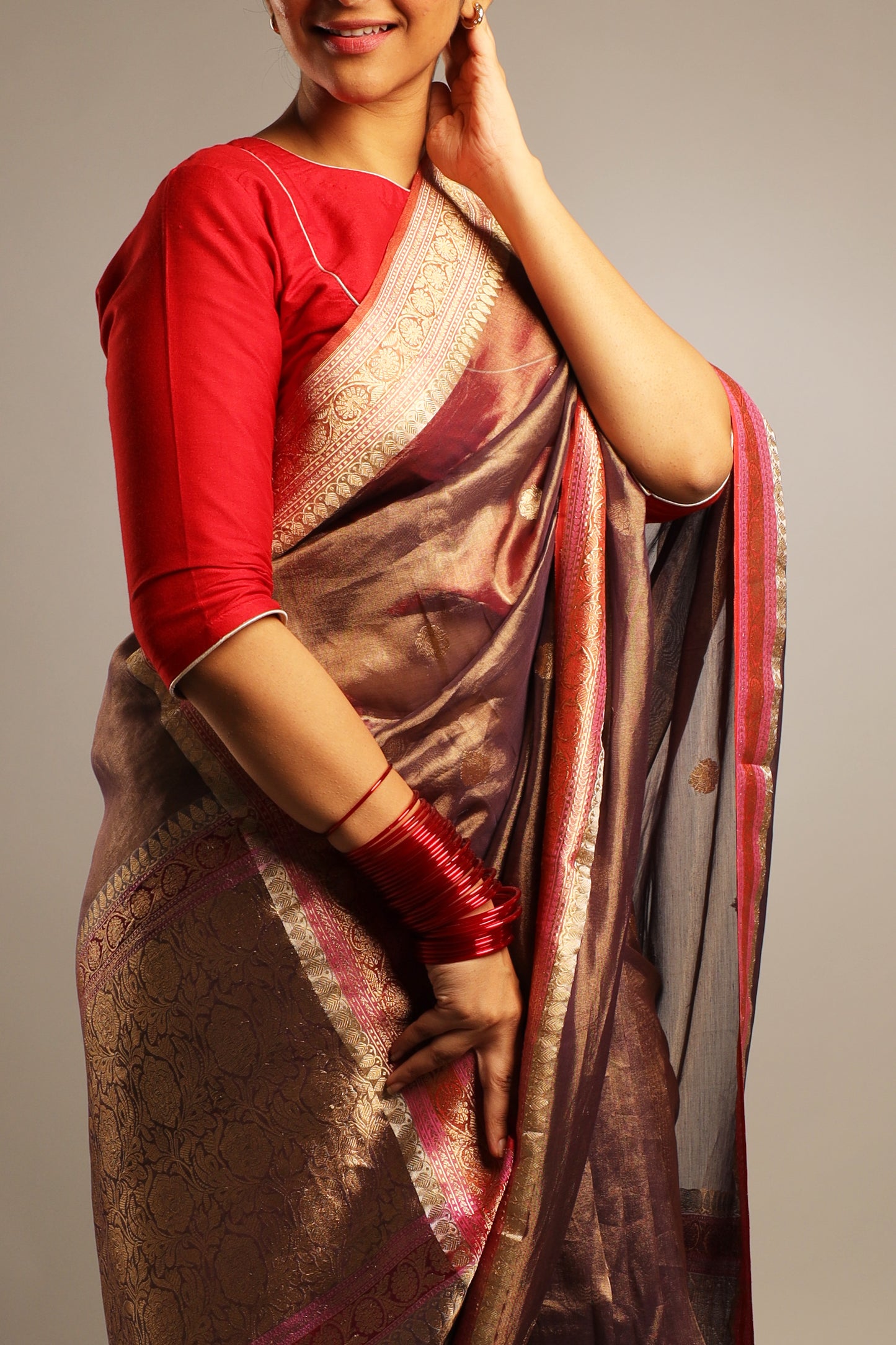 Pure Katan Tissue Metallic Payne Grey Saree with Gold Kadwa Buta and Raspberry Pink, and Gold Motif Border