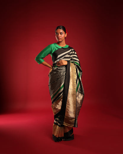 Exquisite Emerald Green, Coal Black, and Silver Grey Striped Pure Katan Silk Banarasi Saree with Muted Gold Art Deco Border