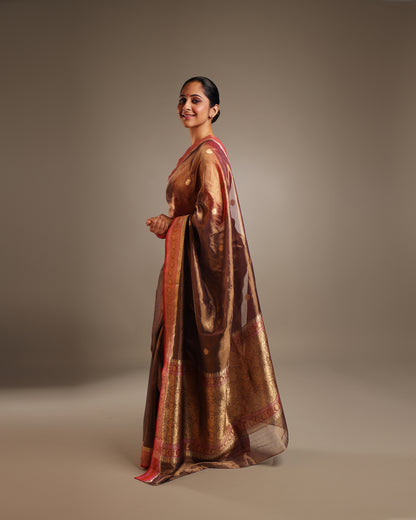 Pure Katan Tissue Metallic Payne Grey Saree with Gold Kadwa Buta and Raspberry Pink, and Gold Motif Border