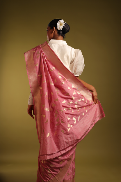 A Soft Vintage Rose Pink With Muted Golden Bird Motifs