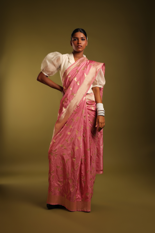 A Soft Vintage Rose Pink With Muted Golden Bird Motifs