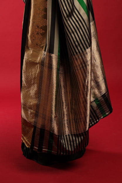 Exquisite Emerald Green, Coal Black, and Silver Grey Striped Pure Katan Silk Banarasi Saree with Muted Gold Art Deco Border